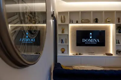 TV o dispositivi per l'intrattenimento presso Domina-Boutique Apartment