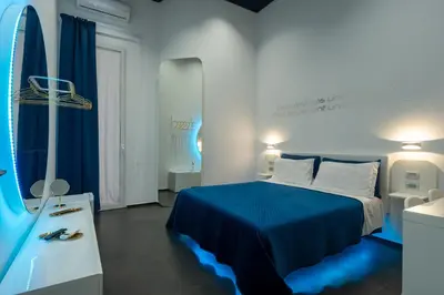 Letto o letti in una camera di Skyhouse Chiatamone