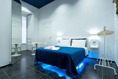 Letto o letti in una camera di Skyhouse Chiatamone