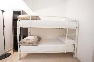Letto o letti in una camera di Pazzariello House By Dimorra