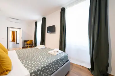 Letto o letti in una camera di Il Vicoletto Maiorani 39