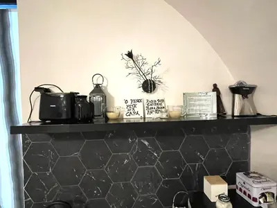Cucina o angolo cottura di House Suite Vetriera Napoli