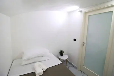 Letto o letti in una camera di San Mattia Home-QuartieriSpagnoli