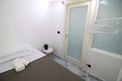 Letto o letti in una camera di San Mattia Home-QuartieriSpagnoli