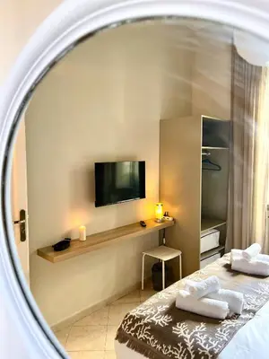 Letto o letti in una camera di Charming Suite Napoli Vomero