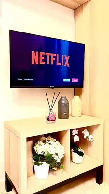 TV o dispositivi per l'intrattenimento presso Charming Suite Napoli Vomero