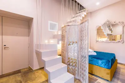 Letto o letti in una camera di Golden Terrace at Historical Center by Napoliapartments