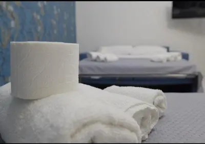 Letto o letti in una camera di Rebby Home
