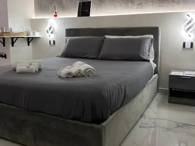 Letto o letti in una camera di Ylisea Luxury B&B