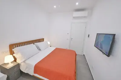 Letto o letti in una camera di Signora Titina Rooms