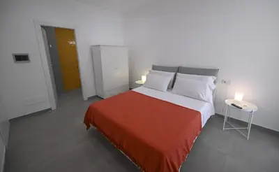 Letto o letti in una camera di Signora Titina Rooms