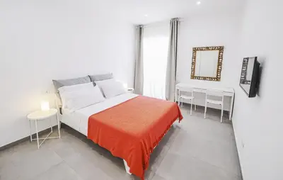 Letto o letti in una camera di Signora Titina Rooms