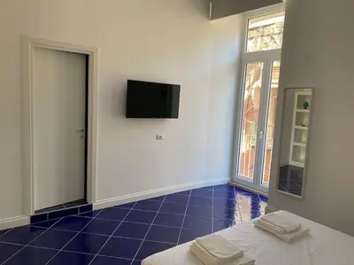 TV o dispositivi per l'intrattenimento presso Maison Olivia, nuovo appartamento in zona Chiaia