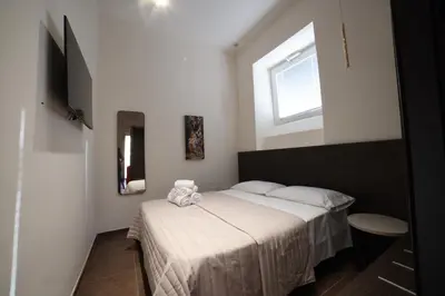 Letto o letti in una camera di Sciuscià beb spaccanapoli