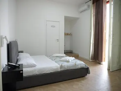 Letto o letti in una camera di Corso Umberto 22 Guest House
