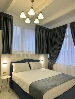 Letto o letti in una camera di Depandance Vania Napoli