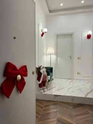 Letto o letti in una camera di Depandance Vania Napoli