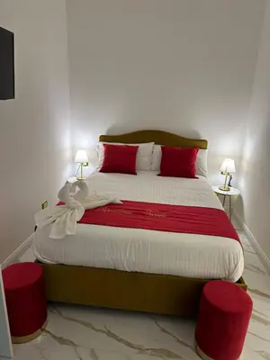 Letto o letti in una camera di Depandance Vania Napoli