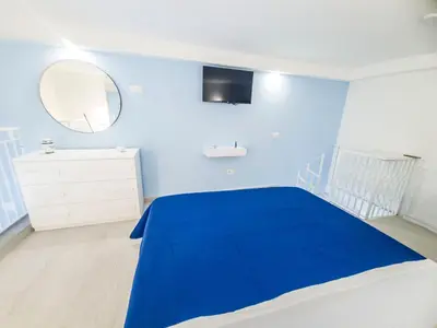 Letto o letti in una camera di Partenope dorata