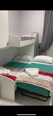 Letto o letti in una camera di La Magica