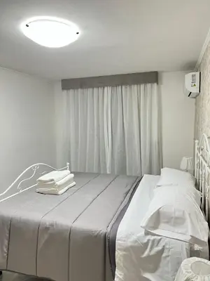 Letto o letti in una camera di Niko house