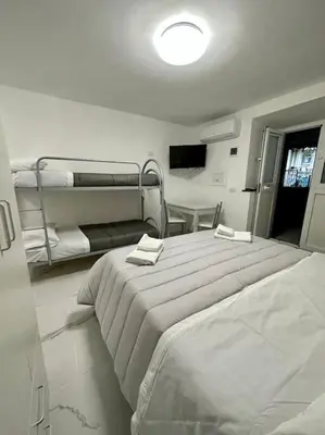 Letto o letti in una camera di Basso Sasà 2