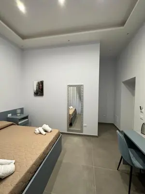 Letto o letti in una camera di Casa vacanze Sant’Agostino