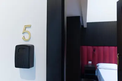Letto o letti in una camera di FiDa Rooms