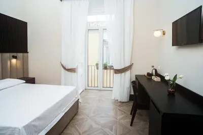 Letto o letti in una camera di FiDa Rooms