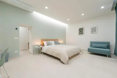 Letto o letti in una camera di Napoli Maison Suite