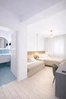 Letto o letti in una camera di VomeRooms