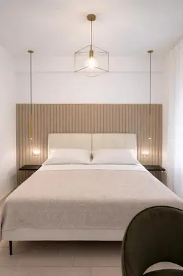 Letto o letti in una camera di VomeRooms