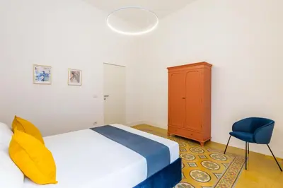 Letto o letti in una camera di Piazza Amedeo Stylish Apartment by Wonderful Italy