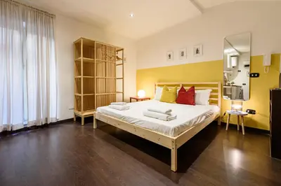Letto o letti in una camera di Via Duomo 196