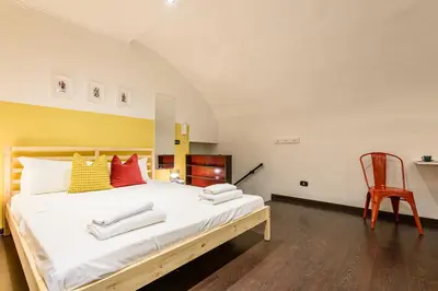 Letto o letti in una camera di Via Duomo 196