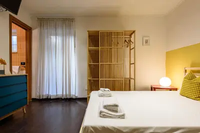 Letto o letti in una camera di Via Duomo 196