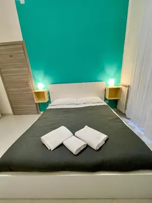 Letto o letti in una camera di Pop Santa Chiara