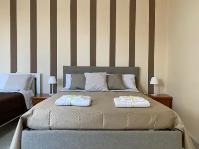 Letto o letti in una camera di Avolina’s Apartment