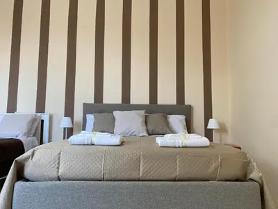 Letto o letti in una camera di Avolina’s Apartment