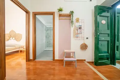 Letto o letti in una camera di Casa Blin Dimora a Chiaia