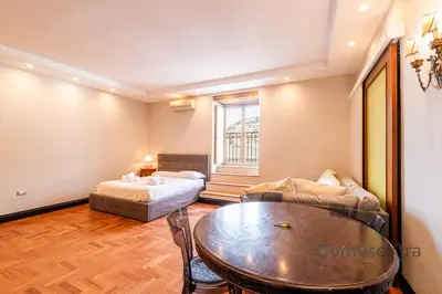 Letto o letti in una camera di Gramsci Relais By DomusExtra