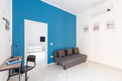 Area soggiorno di White&Blue Apartment at Sanità by Wonderful Italy