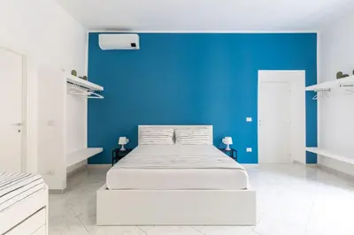 Letto o letti in una camera di White&Blue Apartment at Sanità by Wonderful Italy