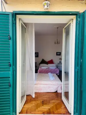 Letto o letti in una camera di La casa sui tetti 2