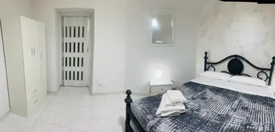 Letto o letti in una camera di Tiffany House (Spaccanapoli)