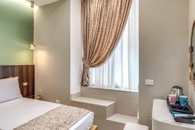 Letto o letti in una camera di Le stanze di Venere