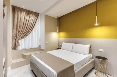 Letto o letti in una camera di Le stanze di Venere
