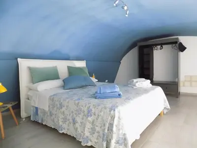 Letto o letti in una camera di Stupendo basso nel Cuore di Napoli