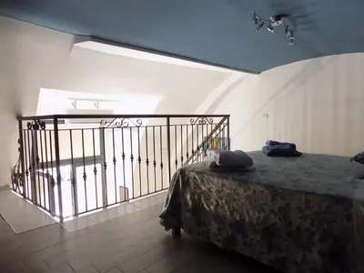Letto o letti in una camera di Stupendo basso nel Cuore di Napoli