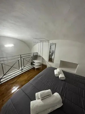 Letto o letti in una camera di Aurora House